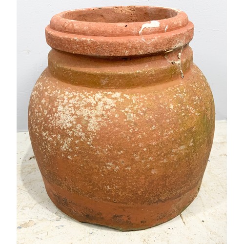 493 - TERRACOTTA  FORCER 33cm TALL WITH  A GARDEN URN 42cm TALL