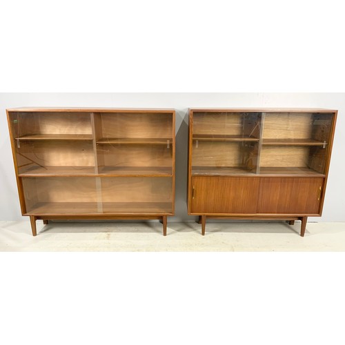 569 - LATE  / MID CENTURY  GLAZED CABINET / BOOKCASE WITH A BEAVER & TAPLEY LABEL WIDTH  122cm WITH A SIMI... 