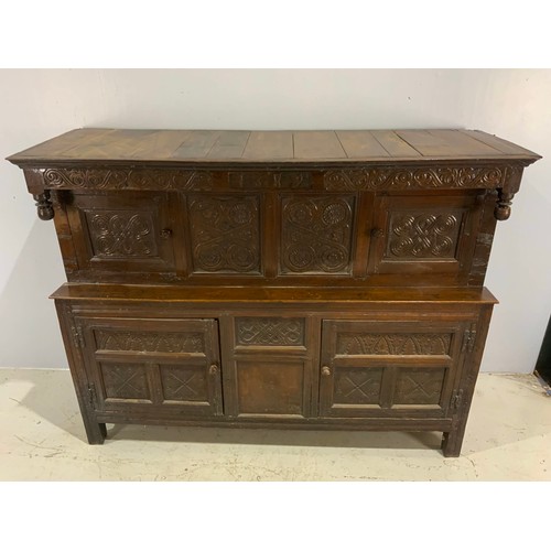 593 - CARVED OAK COURT CUPBOARD ON STILE FEET, CARVED DATE 1689 BUT BELIEVED TO BE LATER, APPROX. 196 cm
P... 