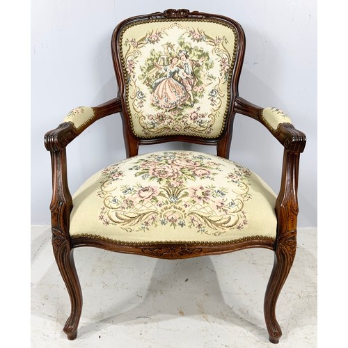 644 - UPHOLSTERED CARVED ARMCHAIR