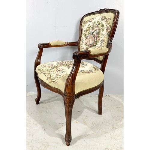 644 - UPHOLSTERED CARVED ARMCHAIR