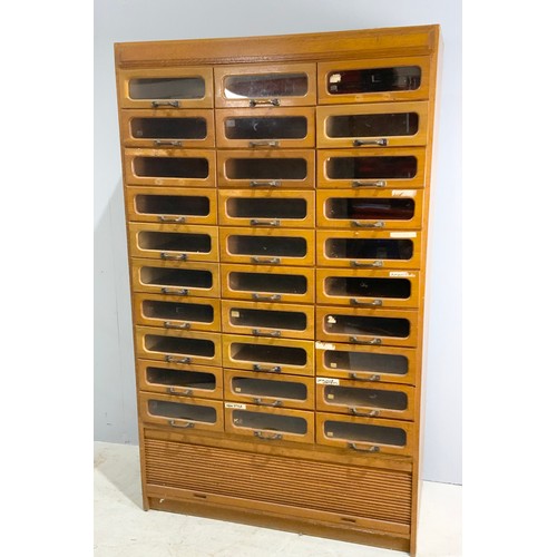 590 - VINTAGE HABERDASHERY CABINET – MID 20TH CENTURY OAK WITH GLASS FRONTED DRAWERS ABOVE A TAMBOUR FRONT... 