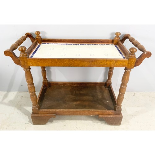 570 - CONTINENTAL OAK HOSTESS TROLLEY / BUFFET WITH TILE TOP. WIDTH 112cm