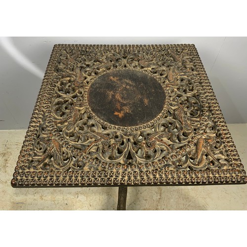 622 - 59cm SQUARE TOP CARVED INDIAN TABLE ON INTRICATELY CARVED PEDESTAL AND TRIPOD BASE