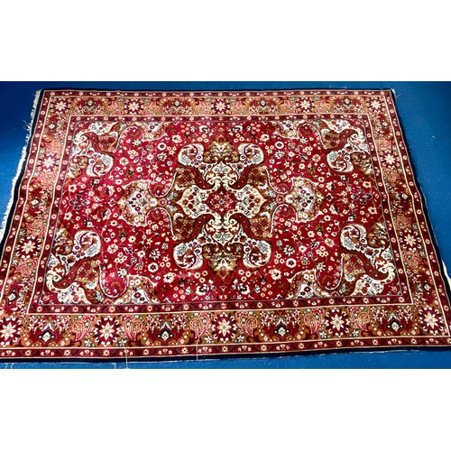 667 - RED GROUND RUG/ CARPET, APPROX. 280 X 199 cm