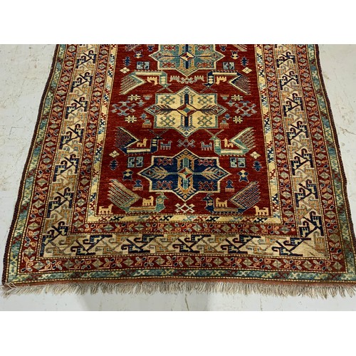 668 - RED GROUND RUG 197cm x 173cm