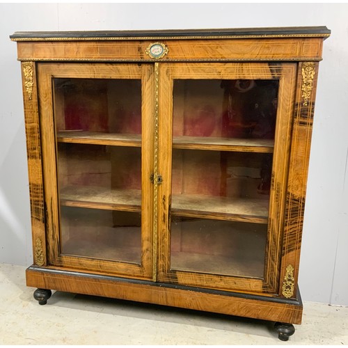 610 - 19TH CENTURY ROSEWOOD GLAZED PIER CABINET WITH DOUBLE DOORS, ORMOLU FITTINGS AND SEVRES STYLE PORCEL... 