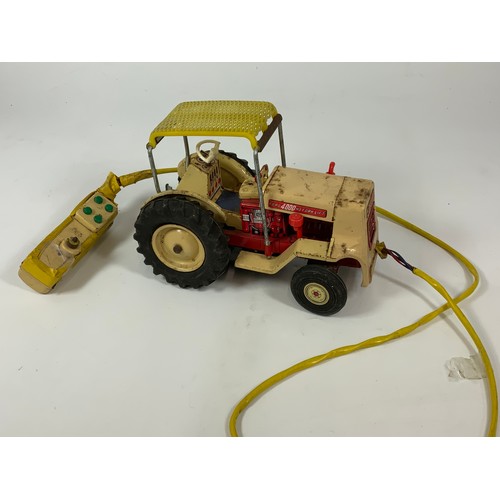 215 - TINPLATE, BATTERY OPERATED FORD 4000 HD FORK LIFT TRACTOR