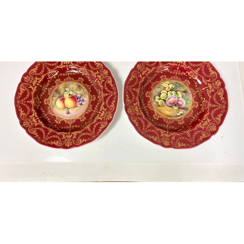 191 - TWO ROYAL WORCESTER HAND PAINTED CABINET PLATES (SECONDS) TOGETHER WITH AN IMARI PATTERNED PLATE