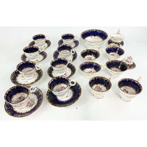 207 - 19th CENTURY  BLUE AND GILT PART TEA SERVICE WITH  HAND PAINTED FLORAL DECORATION