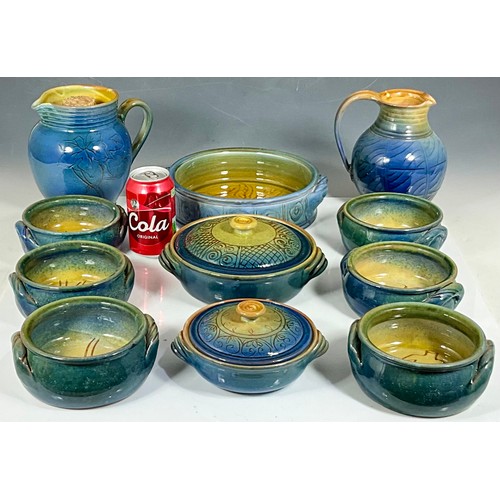 257 - SYLVIE DURIEZ BLUE GLAZED SOUP BOWLS, SERVING DISHES AND PITCHERS