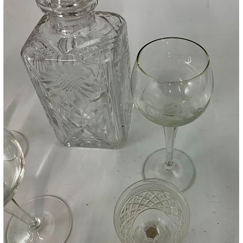 288 - CUT GLASS DECANTER WITH ETCHED SUNFLOWERS DECORATION, THREE ETCHED WINE GLASSES WITH HORSE AND RIDER... 