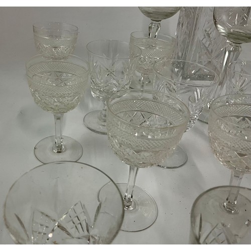 288 - CUT GLASS DECANTER WITH ETCHED SUNFLOWERS DECORATION, THREE ETCHED WINE GLASSES WITH HORSE AND RIDER... 