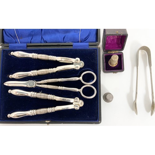 330 - CASED SILVER PLATED NUT CRACKERS AND GRAPE SHEARS, THIMBLE IN BENSON CASE, ONE OTHER THIMBLE AND TON... 