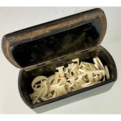 427 - UNUSUAL 19TH CENTURY PAPIER MACHE BOX CONTAINING LETTERS CUT FROM BONE (POSSIBLY P.O.W)