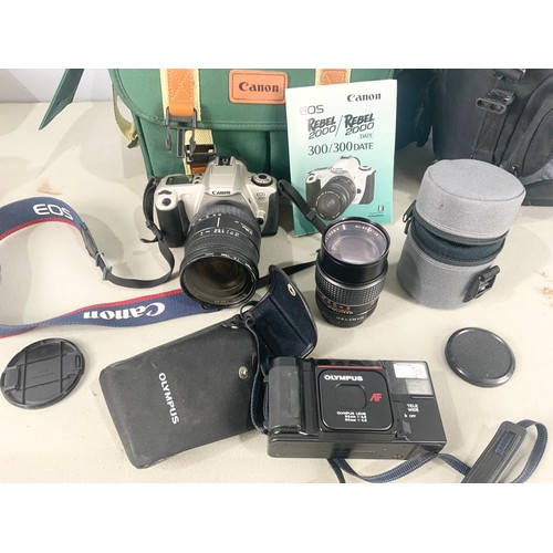 441 - CANON  EOS 300 REBEL 2000  CAMERA WITH A SIGMA 28-200MM ZOOM, UNDERGROUND LENSE, ACCESSOIRES CASE ET... 