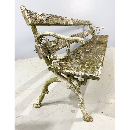 555 - WOODEN BENCH WITH CAST IRON STYLISED BRANCH WINGS WIDTH 242cm