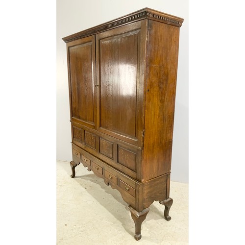 644 - OAK 2 DOOR CUPBOARD WITH 5 DRAWERS BELOW WIDTH 146cm , 182cm TALL