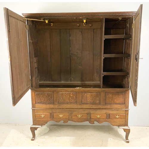 644 - OAK 2 DOOR CUPBOARD WITH 5 DRAWERS BELOW WIDTH 146cm , 182cm TALL