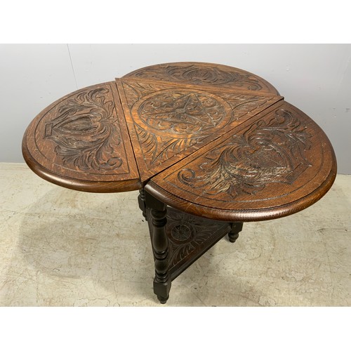 624 - CARVED OAK DROP FLAP TRIANGULAR TABLE