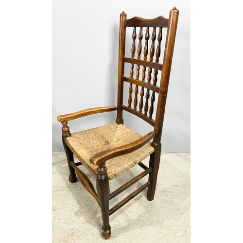 708 - LADDER BACK ROCKING CHAIR WITH RUSH SEAT &  A SPINDLE BACK ARM CHAIR WITH RUSH SEAT