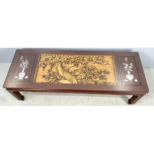 650 - ORIENTAL HARDWOOD OPIUM / COFFEE TABLE WITH INCRITATLEY CARVED CENTRAL PANEL WITH GLASS TOP 138cm x ... 