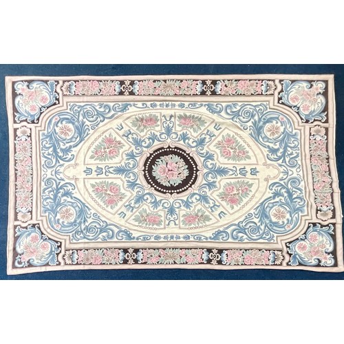 729 - CREWEL WORK RUG HAVING CENTRAL PANEL OF STYLISED FLOWERS AND FOLIAGE ON MOUNTED CREAM GROUND. Approx... 