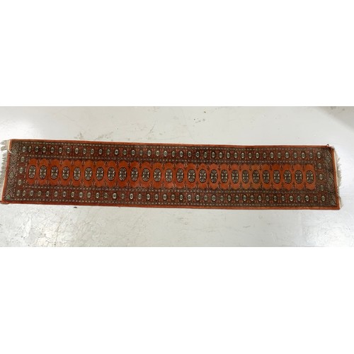 726 - HAND KNOTTED TRADITIONAL PERSIAN RUST COLOURED BOKHARA RUNNER APPROX 63X318CM