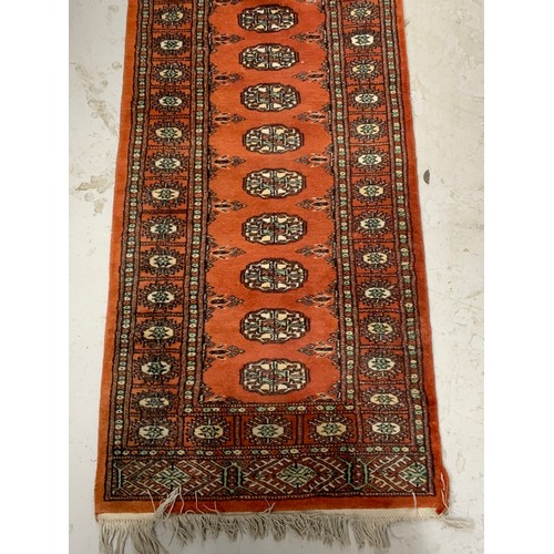 726 - HAND KNOTTED TRADITIONAL PERSIAN RUST COLOURED BOKHARA RUNNER APPROX 63X318CM