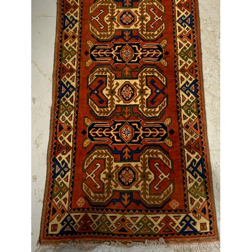 724 - PERSIAN TRADITIONAL RUST COLOURED HAND KNOTTED RUNNER APPROX 291X78