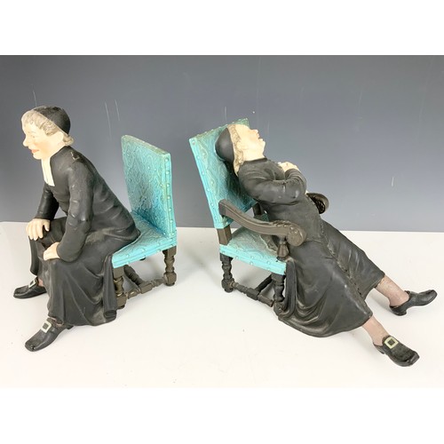 104 - 2 PORCELAIN FIGURES DEPICTING RELIGIOUS SUBJECTS. LEANING BACK FIGURE SADLY AF, CHAIR LEGS HAVE BECO... 