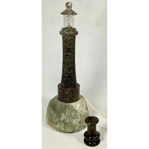 263 - CORNISH SERPENTINE LAMP BASE MODELLED AS A LIGHTHOUSE ON GRANITE BASE T/W A MINIATURE POLISHED STONE... 