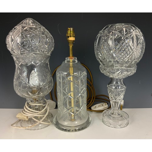 274 - 2 GLASS TABLE LAMPS AND A GLASS TABLE LIGHT BASE