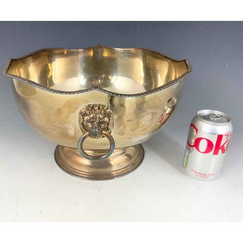 294 - LARGE SILVER  PLATED PUNCH BOWL WITH LION MASK & RING HANDLES, TODDY LADLE, LARGE SERVING SPOON ETC