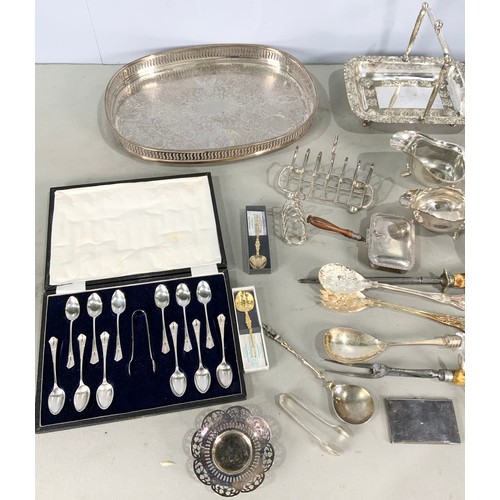 299 - LARGE QUANTITY OF SILVER PLATED WARE INC 4 PIECE TEA SET , TOAST RACKS , CASED SPOONS, GALLERIED TRA... 