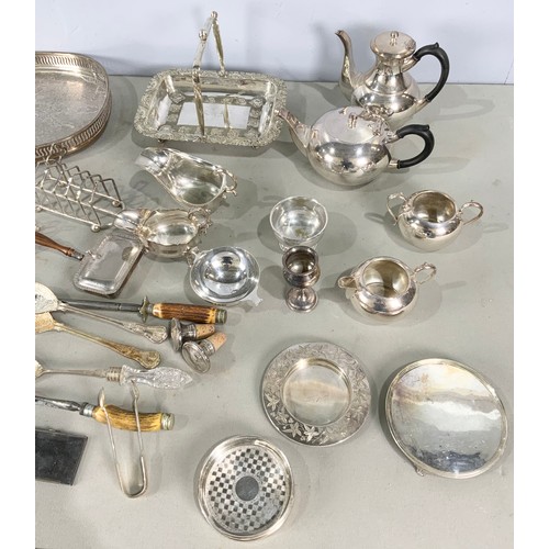 299 - LARGE QUANTITY OF SILVER PLATED WARE INC 4 PIECE TEA SET , TOAST RACKS , CASED SPOONS, GALLERIED TRA... 