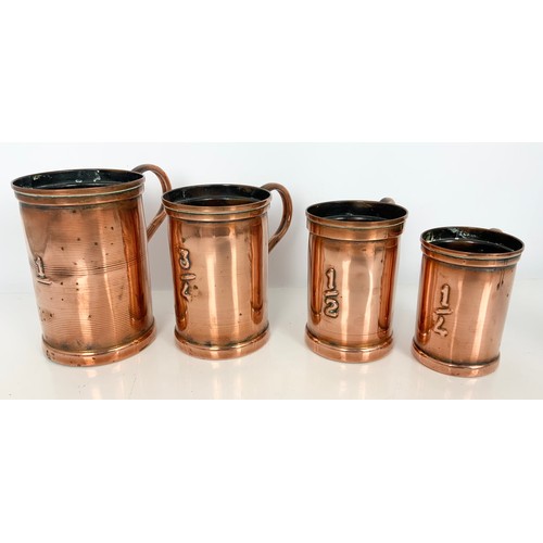 319 - FOUR GRADUATED COPPER TANKARDS TOGETHER WITH TWO SILVER PLATED PHEASANTS