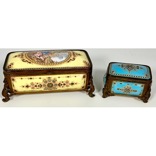 174 - 2 DECORATIVE CERAMIC CIGARETTE BOXES EACH EMBELLISHED WITH BEADING AND WITH ORNAMENTAL FEET, POSSIBL... 