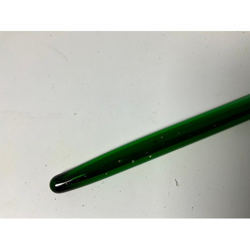 207 - GREEN COLOURED GLASS CANE. Approx. 87cm long