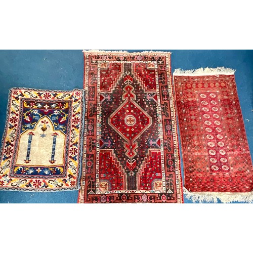 742 - LARGE RED GROUND RUG Approx. 252 x 141cm, SMALLER RUG Approx. 156 x 115cm AND TURKOMAN STYLE RED GRO... 