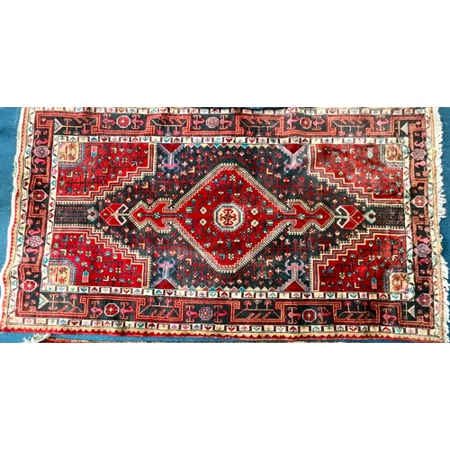 742 - LARGE RED GROUND RUG Approx. 252 x 141cm, SMALLER RUG Approx. 156 x 115cm AND TURKOMAN STYLE RED GRO... 