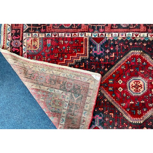 742 - LARGE RED GROUND RUG Approx. 252 x 141cm, SMALLER RUG Approx. 156 x 115cm AND TURKOMAN STYLE RED GRO... 