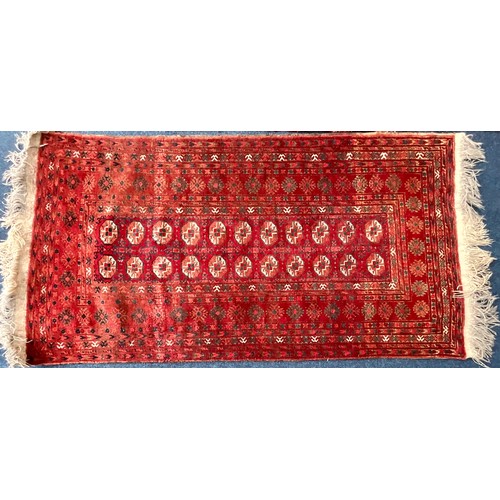 742 - LARGE RED GROUND RUG Approx. 252 x 141cm, SMALLER RUG Approx. 156 x 115cm AND TURKOMAN STYLE RED GRO... 