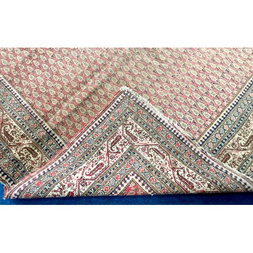 746 - ORIENTAL RED GROUND RUG IN THE PERSIAN ARAK STYLE (WE ARE ADVISED THAT THIS WAS PURCHASED BY THE VEN... 