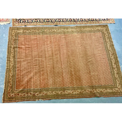 746 - ORIENTAL RED GROUND RUG IN THE PERSIAN ARAK STYLE (WE ARE ADVISED THAT THIS WAS PURCHASED BY THE VEN... 