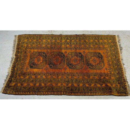 745 - ORANGE GROUND RUG WITH GEOMETRIC PATTERN 203cm x 127cm