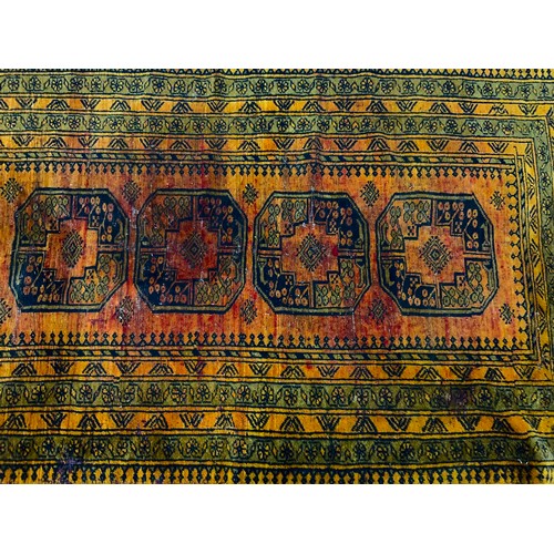 745 - ORANGE GROUND RUG WITH GEOMETRIC PATTERN 203cm x 127cm