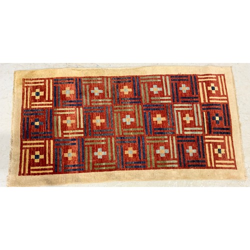 743 - TWO RED GROUND RUGS LARGEST 198cm x 102cm