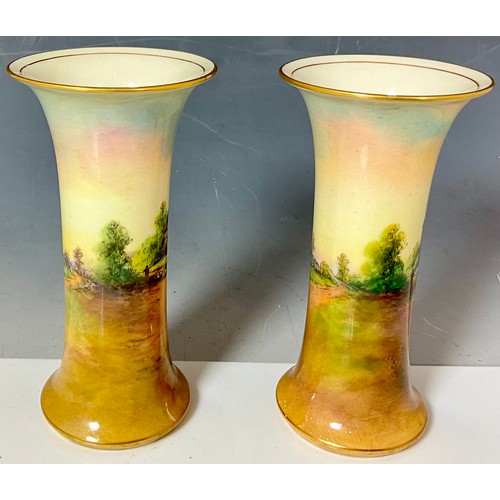 82 - PAIR OF ROYAL WORCESTER SPILL VASES, EACH PAINTED WITH A VILLAGE SCENE ELMLEY