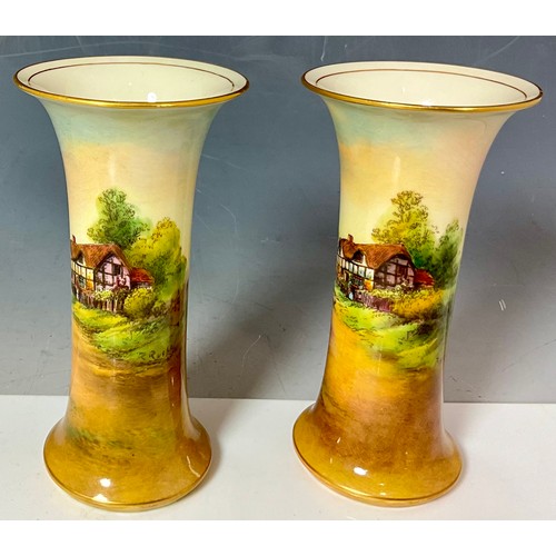 82 - PAIR OF ROYAL WORCESTER SPILL VASES, EACH PAINTED WITH A VILLAGE SCENE ELMLEY